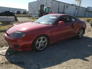 2005 Hyundai Tiburon GT z VIN KMHHN65F85U182644, wystawiony jako Copart lot #63826104 z przebiegiem 100 245 mil mil oraz Szkody całkowita. Historia ofert i sprzedaży dostępna na DreamBid. Obrazek 1.