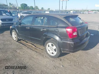 2008 Dodge Caliber SE with VIN 1B3HB28B58D776158, listed as a IAAI auction lot 41872879 with 197,843 mi miles and . Bid and sale history available at DreamBid. Image 3.