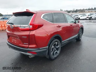 2017 Honda CR-V Touring with VIN 2HKRW2H9XHH683988, listed as a IAAI auction lot 41740218 with 55,488 mi miles. Bid and sale history available at carsss.com. Image 4.