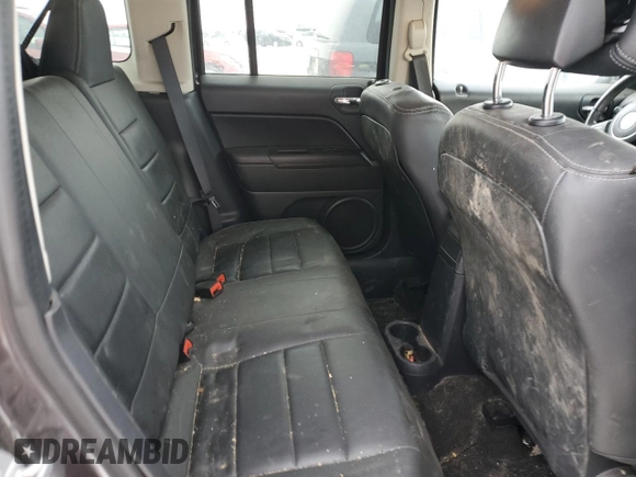 2015 Jeep Patriot North with VIN 1C4NJRAB7FD311725, listed as a Copart auction lot 82647074 with 185,560 mi miles and Salvage Title. Bid and sale history available at carsss.com. Image 11.