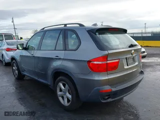 2007 BMW X5 3.0si with VIN 5UXFE43517LY81728, listed as a IAAI auction lot 41787988 with 82,999 mi miles. Bid and sale history available at carsss.com. Image 3.