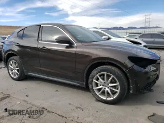 2018 Alfa Romeo Stelvio Ti z VIN ZASFAKBN6J7B80421, wystawiony jako Copart lot #43687775 z przebiegiem 81 426 mil mil oraz Czysty tytuł • Clean title. Historia ofert i sprzedaży dostępna na DreamBid. Obrazek 4.
