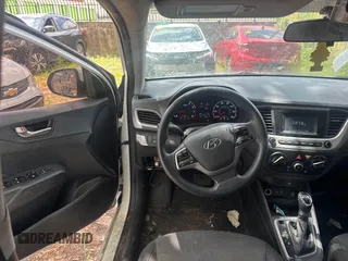 2019 Hyundai Accent SE with VIN 3KPC24A38KE077040, listed as a IAAI auction lot 42212005 with 93,911 mi miles and . Bid and sale history available at DreamBid. Image 5.