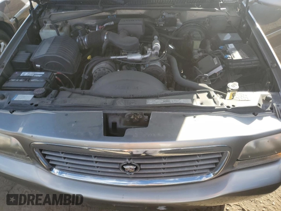 2000 Cadillac Escalade z VIN 1GYEK63R3YR218500, wystawiony jako Copart lot #77676354 z przebiegiem 164 602 mil mil oraz Czysty tytuł • Clean title. Historia ofert i sprzedaży dostępna na DreamBid. Obrazek 12.