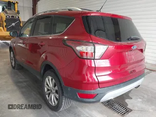 2017 Ford Escape Titanium with VIN 1FMCU9J91HUA32264, listed as a IAAI auction lot 42050273 with 201,128 mi miles. Bid and sale history available at carsss.com. Image 3.