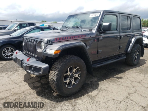 2018 Jeep Wrangler Unlimited Rubicon with VIN 1C4HJXFG1JW261472, listed as a Copart auction lot 63259345 with 60,457 mi miles and Salvage title. Bid and sale history available at DreamBid. Image 1.