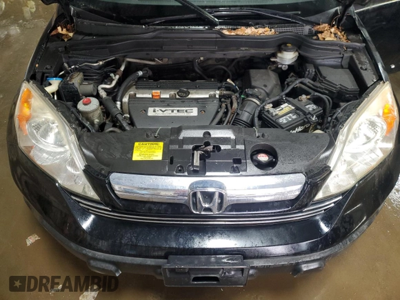 2007 Honda CR-V EX-L z VIN JHLRE48747C071943, wystawiony jako Copart lot #48803725 z przebiegiem 138 448 mil mil oraz Szkoda całkowita • Salvage title. Historia ofert i sprzedaży dostępna na DreamBid. Obrazek 11.