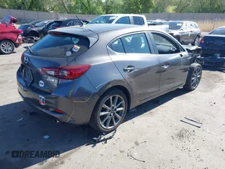 2018 Mazda 3 Touring with VIN 3MZBN1L34JM164952, listed as a IAAI auction lot 42179420 with 106,706 mi miles and . Bid and sale history available at DreamBid. Image 4.