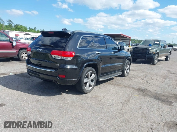 2014 Jeep Grand Cherokee Overland with VIN 1C4RJECG8EC417995, listed as a IAAI auction lot 41959550 with 155,029 mi miles. Bid and sale history available at carsss.com. Image 4.