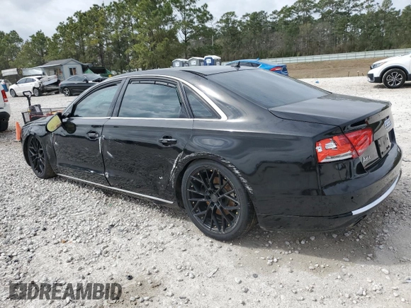 2014 Audi A8 3.0T z VIN WAURGAFD2EN002567, wystawiony jako Copart lot #48188395 z przebiegiem 159 477 mil mil oraz Szkody całkowita. Historia ofert i sprzedaży dostępna na DreamBid. Obrazek 2.