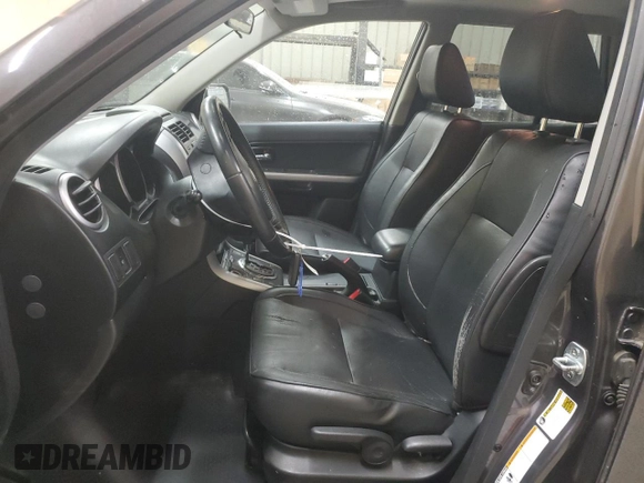 2012 Suzuki Grand Vitara Limited z VIN JS3TE0D78C4100383, wystawiony jako Copart lot #49240925 z przebiegiem 175 570 mil mil oraz Czysty tytuł • Clean title. Historia ofert i sprzedaży dostępna na DreamBid. Obrazek 7.