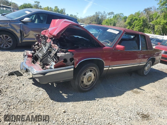 1991 Cadillac DeVille z VIN 1G6CD13B7M4306411, wystawiony jako Copart lot #50128155 z przebiegiem Nie podano mil oraz Szkoda całkowita • Salvage title. Historia ofert i sprzedaży dostępna na DreamBid. Obrazek 1.