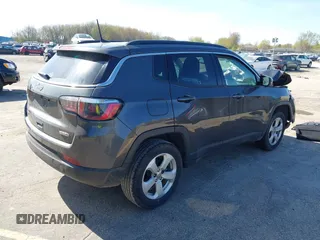 2018 Jeep Compass Altitude with VIN 3C4NJDBB6JT239565, listed as a IAAI auction lot 42219401 with 85,013 mi miles and . Bid and sale history available at DreamBid. Image 4.