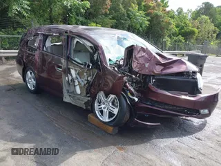2012 Honda Odyssey Touring with VIN 5FNRL5H98CB035454, listed as a IAAI auction lot 42285987 with Not provided miles and . Bid and sale history available at DreamBid. Image 1.