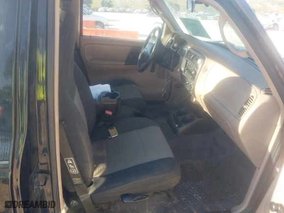 2003 Ford Ranger XL with VIN 1FTYR10U23PA44921, listed as a IAAI auction lot 41788023 with 128,034 mi miles. Bid and sale history available at carsss.com. Image 5.