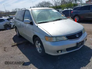 2001 Honda Odyssey EX z VIN 2HKRL18661H597205, wystawiony jako IAAI lot #41838509 z przebiegiem 317 084 mil mil oraz . Historia ofert i sprzedaży dostępna na DreamBid. Obrazek 1.