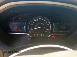 2016 Lincoln MKZ Hybrid z VIN 3LN6L2LU2GR625176, wystawiony jako Copart lot #54044385 z przebiegiem 124 861 mil mil oraz Szkoda całkowita • Salvage title. Historia ofert i sprzedaży dostępna na DreamBid. Obrazek 9.