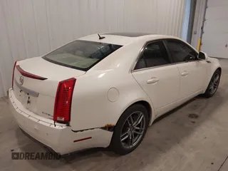 2008 Cadillac CTS AWD w/1SB with VIN 1G6DT57V880142764, listed as a IAAI auction lot 42037968 with 141,208 mi miles. Bid and sale history available at carsss.com. Image 4.