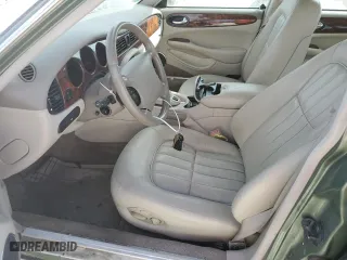 1999 Jaguar XJ with VIN SAJHD1043XC869413, listed as a Copart auction lot 76940624 with 0 mi miles and Salvage Title. Bid and sale history available at carsss.com. Image 7.