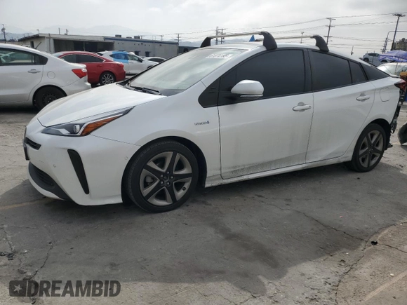 2021 Toyota Prius L Eco with VIN JTDKAMFUXM3149396, listed as a Copart auction lot 61874195 with 126,473 mi miles and Salvage title. Bid and sale history available at DreamBid. Image 1.