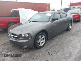 2009 Dodge Charger SXT with VIN 2B3KA33V59H573761, listed as a IAAI auction lot 41545196 with 172,065 mi miles and . Bid and sale history available at carsss.com. Image 2.