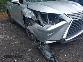 2018 Lexus RX 350 z VIN 2T2ZZMCA4JC100212, wystawiony jako IAAI lot #42197456 z przebiegiem 63 078 mil mil oraz . Historia ofert i sprzedaży dostępna na DreamBid. Obrazek 6.