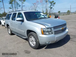 2013 Chevrolet Suburban LT with VIN 1GNSKJE71DR213143, listed as a IAAI auction lot 41585336 with 103,635 mi miles. Bid and sale history available at carsss.com. Image 1.