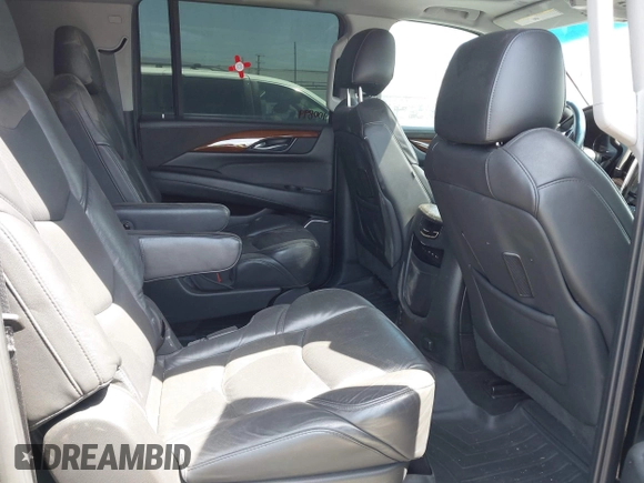 2018 Cadillac Escalade ESV Premium Luxury z VIN 1GYS4JKJ3JR160602, wystawiony jako IAAI lot #42075001 z przebiegiem 100 899 mil mil oraz . Historia ofert i sprzedaży dostępna na DreamBid. Obrazek 8.