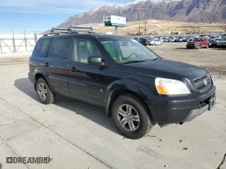 2004 Honda Pilot EX with VIN 5FNYF18684B009407, listed as a Copart auction lot 82195634 with 217,683 mi miles and Salvage Title. Bid and sale history available at carsss.com. Image 4.