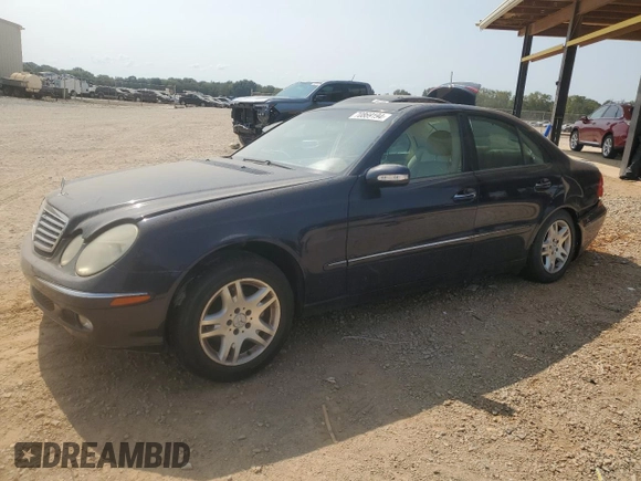 2003 Mercedes-Benz E-Class 3.2L with VIN WDBUF65JX3A313638, listed as a Copart auction lot 70869194 with 142,524 mi miles and Salvage Title. Bid and sale history available at carsss.com. Image 1.