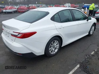 2025 Toyota Camry LE with VIN 4T1DAACK1SU504839, listed as a IAAI auction lot 41845964 with 11,934 mi miles and . Bid and sale history available at DreamBid. Image 4.