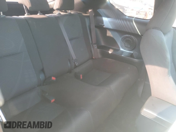 2012 Scion tC z VIN JTKJF5C73C3034583, wystawiony jako Copart lot #74317714 z przebiegiem 163 158 mil mil oraz Czysty tytuł • Clean title. Historia ofert i sprzedaży dostępna na DreamBid. Obrazek 10.