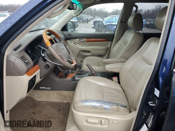2007 Lexus GX 470 z VIN JTJBT20X670128310, wystawiony jako Copart lot #52698535 z przebiegiem 204 884 mil mil oraz Tytuł czysty. Historia ofert i sprzedaży dostępna na DreamBid. Obrazek 7.