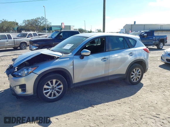 2016 Mazda CX-5 Sport with VIN JM3KE2BE9G0915168, listed as a IAAI auction lot 41482749 with 86,802 mi miles and . Bid and sale history available at carsss.com. Image 14.