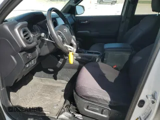 2021 Toyota Tacoma SR z VIN 3TMCZ5AN8MM387166, wystawiony jako Copart lot #49952935 z przebiegiem 63 175 mil mil oraz Szkoda całkowita • Salvage title. Historia ofert i sprzedaży dostępna na DreamBid. Obrazek 7.