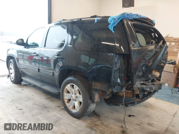 2011 GMC Yukon SLT z VIN 1GKS2CE00BR260589, wystawiony jako IAAI lot #41858005 z przebiegiem 191 594 mil mil oraz . Historia ofert i sprzedaży dostępna na DreamBid. Obrazek 3.