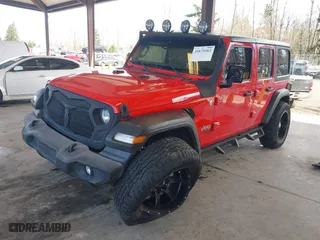 2019 Jeep Wrangler Unlimited Sport S with VIN 1C4HJXDN4KW637889, listed as a IAAI auction lot 41675162 with 150,098 mi miles. Bid and sale history available at carsss.com. Image 18.