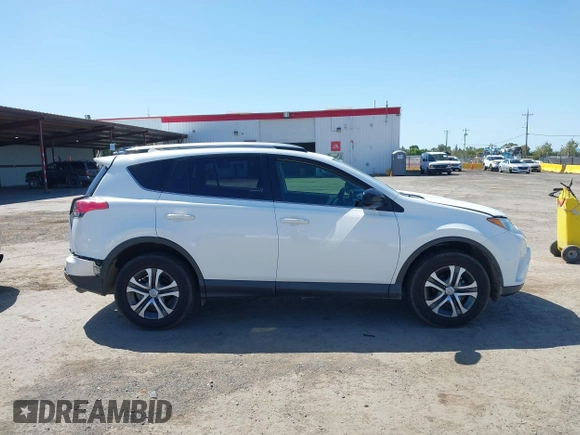2017 Toyota RAV4 LE with VIN JTMBFREV9HJ147391, listed as a IAAI auction lot 41993617 with 90,666 mi miles. Bid and sale history available at carsss.com. Image 13.