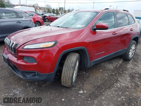 2014 Jeep Cherokee Latitude with VIN 1C4PJMCS0EW261021, listed as a IAAI auction lot 41986701 with 114,633 mi miles. Bid and sale history available at carsss.com. Image 14.