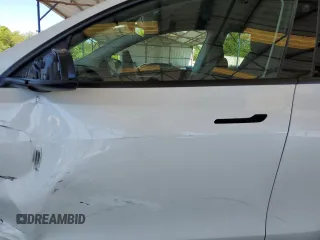 2024 Tesla Model Y с VIN 7SAYGDED5RF086456, выставлен на аукционе Copart как лот 57994835 с пробегом Не указан миль и Списание • Salvage title. История ставок и продаж доступна на DreamBid. Изображение 7.