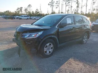 2015 Honda CR-V LX with VIN 2HKRM3H38FH512323, listed as a IAAI auction lot 39161499 with 133,787 mi miles. Bid and sale history available at carsss.com. Image 2.