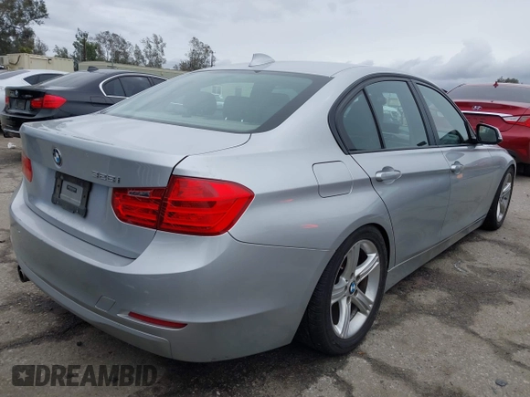 2014 BMW 3 Series 328i with VIN WBA3C1C53EK109613, listed as a IAAI auction lot 41713060 with 141,240 mi miles. Bid and sale history available at carsss.com. Image 4.