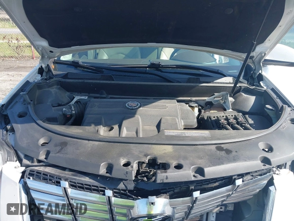 2013 Cadillac SRX Luxury Collection with VIN 3GYFNCE33DS608040, listed as a IAAI auction lot 41912860 with 128,295 mi miles and . Bid and sale history available at DreamBid. Image 10.