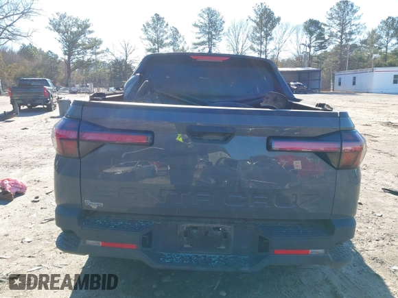 2022 Hyundai Santa Cruz SEL with VIN 5NTJB4AE7NH014148, listed as a IAAI auction lot 41263713 with 70,619 mi miles and . Bid and sale history available at DreamBid. Image 16.