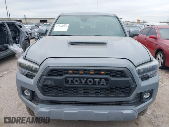 2021 Toyota Tacoma 4WD SR5 with VIN 3TMDZ5BN5MM116584, listed as a IAAI auction lot 41548175 with 23,031 mi miles. Bid and sale history available at carsss.com. Image 6.