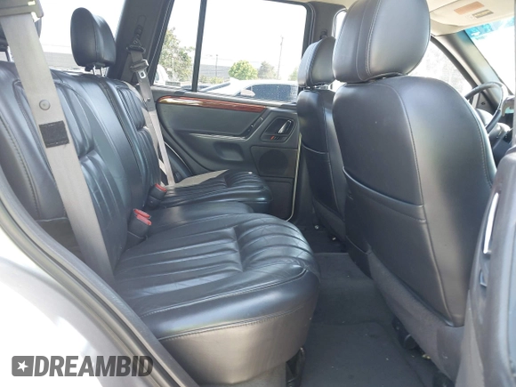 1999 Jeep Grand Cherokee Limited с VIN 1J4GW68S9XC666797, выставлен на аукционе IAAI как лот 42304461 с пробегом 228 464 миль миль и . История ставок и продаж доступна на DreamBid. Изображение 8.