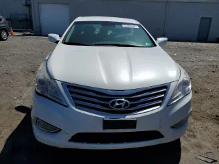 2013 Hyundai Azera with VIN KMHFG4JG4DA223002, listed as a Copart auction lot 54886085 with 164,125 mi miles and Clean Title. Bid and sale history available at carsss.com. Image 5.