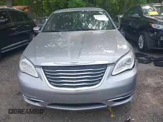 2014 Chrysler 200 LX z VIN 1C3CCBAB6EN211217, wystawiony jako IAAI lot #42169450 z przebiegiem 97 948 mil mil oraz . Historia ofert i sprzedaży dostępna na DreamBid. Obrazek 11.
