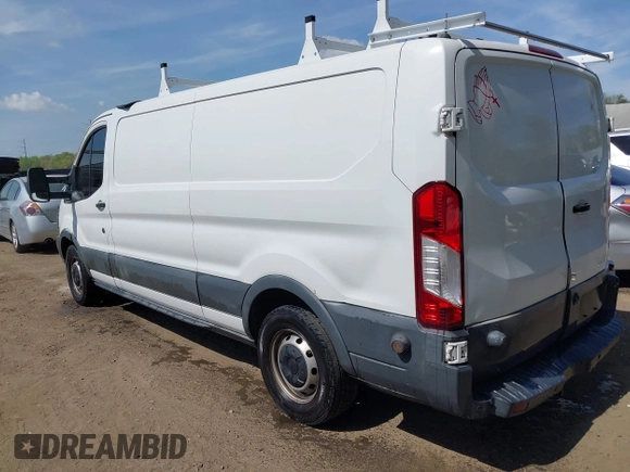 2015 Ford Transit with VIN 1FTNE2YM7FKB00894, listed as a IAAI auction lot 42088996 with 199,321 mi miles and . Bid and sale history available at DreamBid. Image 3.