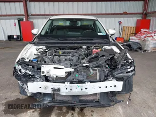 2019 Mazda 3 w/Select with VIN JM1BPACL2K1106916, listed as a IAAI auction lot 42082381 with 63,017 mi miles. Bid and sale history available at carsss.com. Image 13.